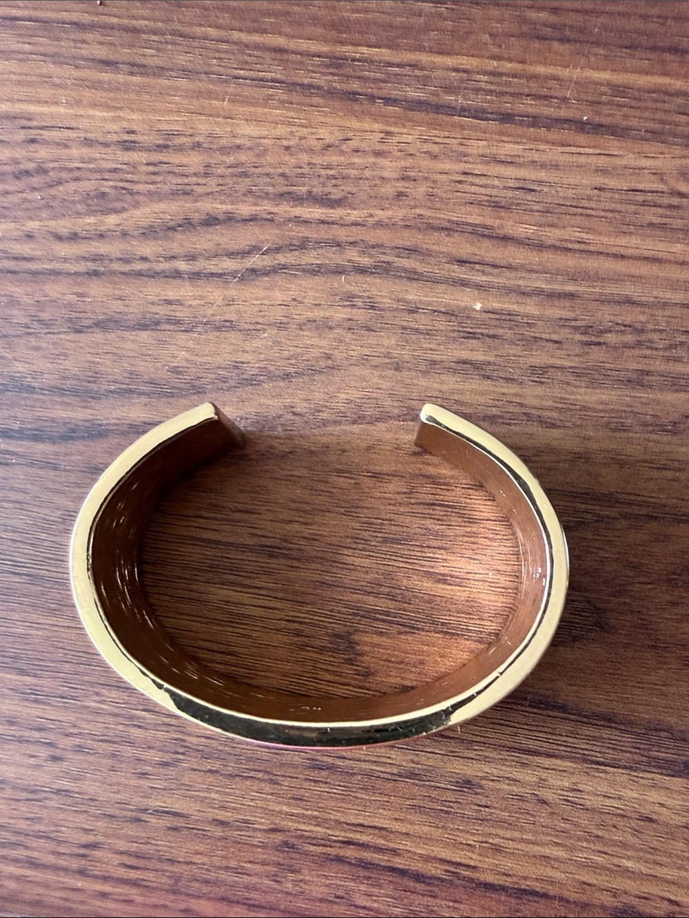 Bangle Bracelet w/Faux Zebra Printed Hide Set in a Gold Tone Elliptical Frame. - Picture 5 of 6